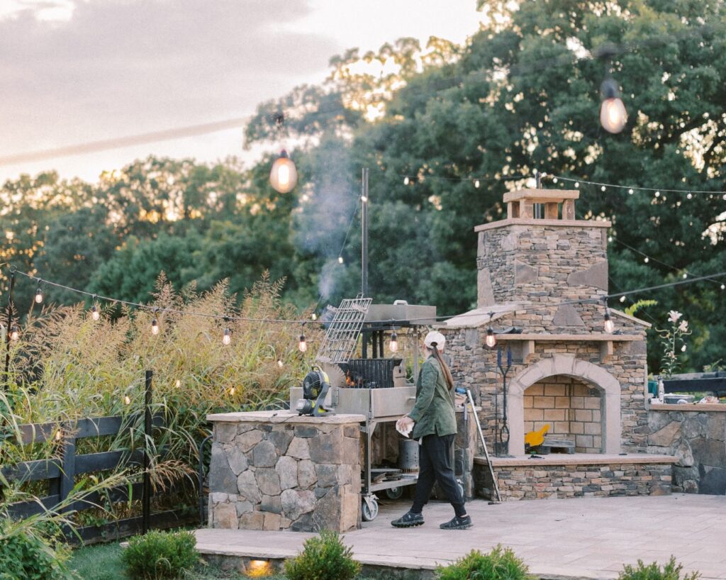 Chef Lynsey working in outdoor kitchen