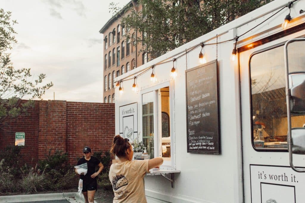 It's worth it food truck serving guests