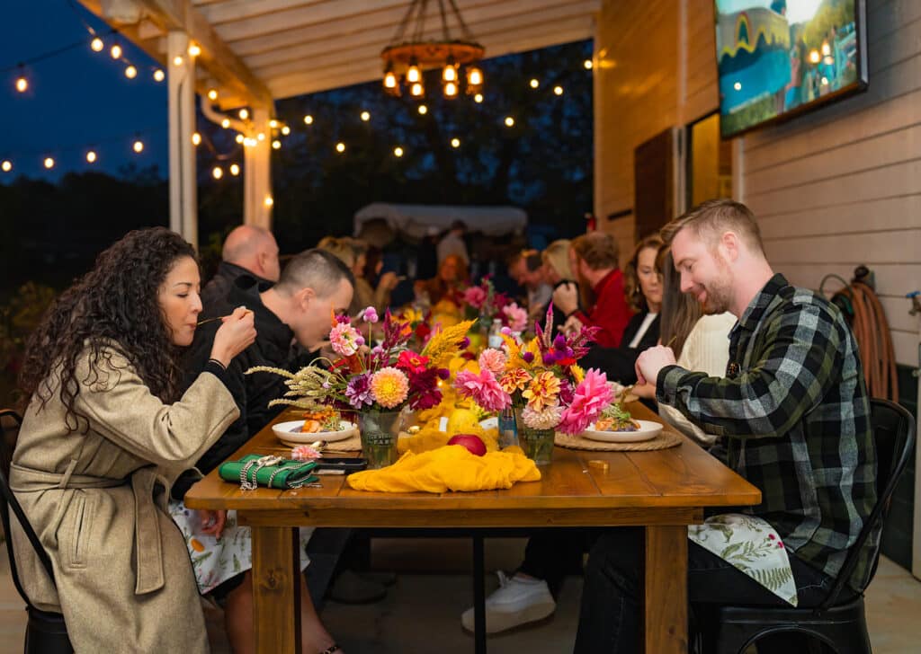 Guests enjoying dinner at a table